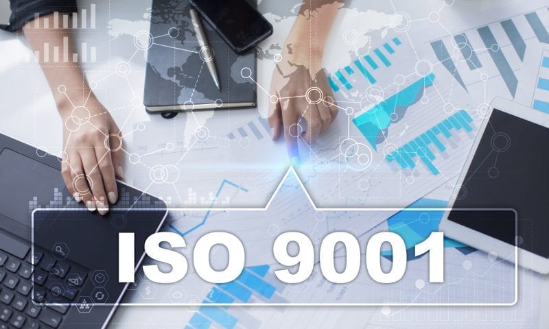 ISO 9001 business woman pointing